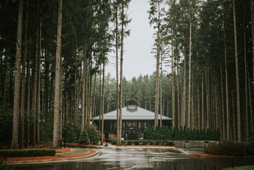 Shepherd’s Hollow Golf Club in Clarkston, Michigan, featuring a stunning wooded landscape and elegant architecture