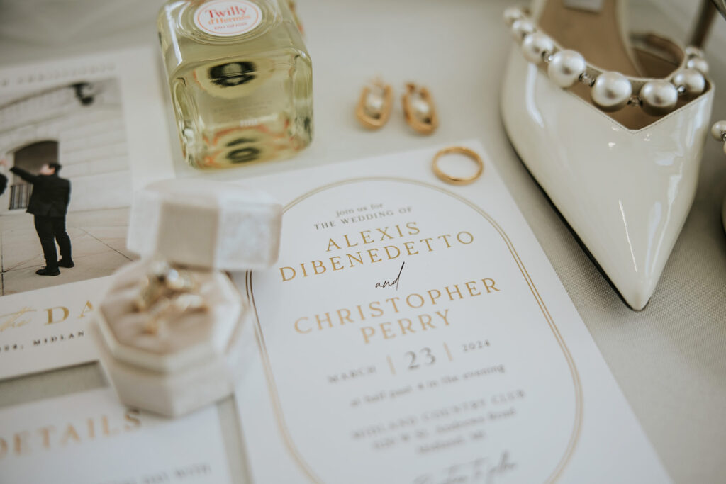 Beautifully styled flat lay of bridal accessories and stationery | Wedding Planning Tips