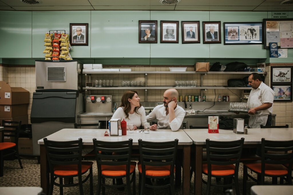 Iconic Lafayette Coney Island in Detroit featured in a winter engagement session.