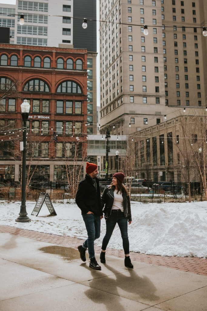 Downtown Detroit streets as the backdrop for a cozy winter engagement session.