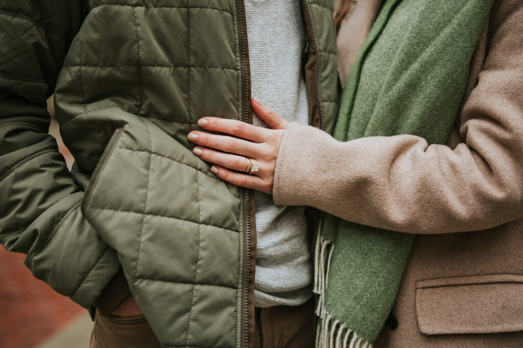 Close up of an engagement right at a downtown Detroit Capitol Park engagement session