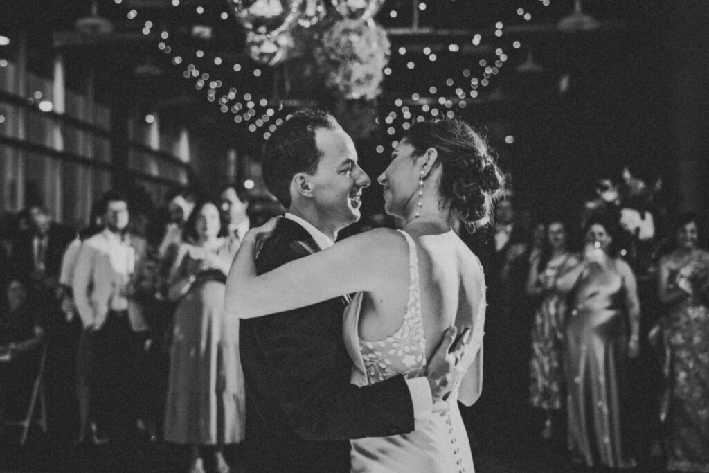 Bride and groom sharing a dance at Waterview Loft, Detroit wedding venue.