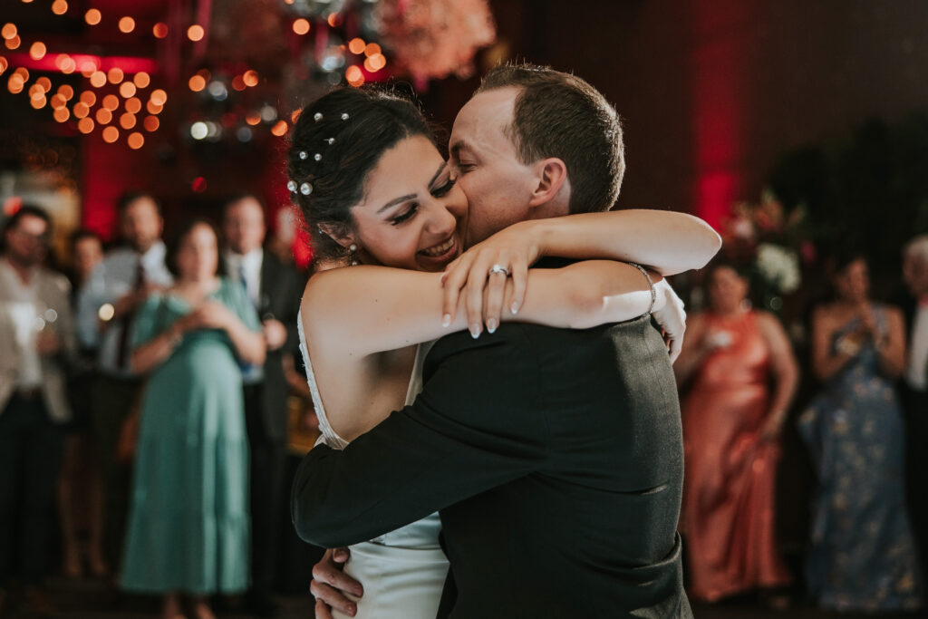 Bride and Groom dancing at their reception at Waterview Loft, Detroit wedding venue.