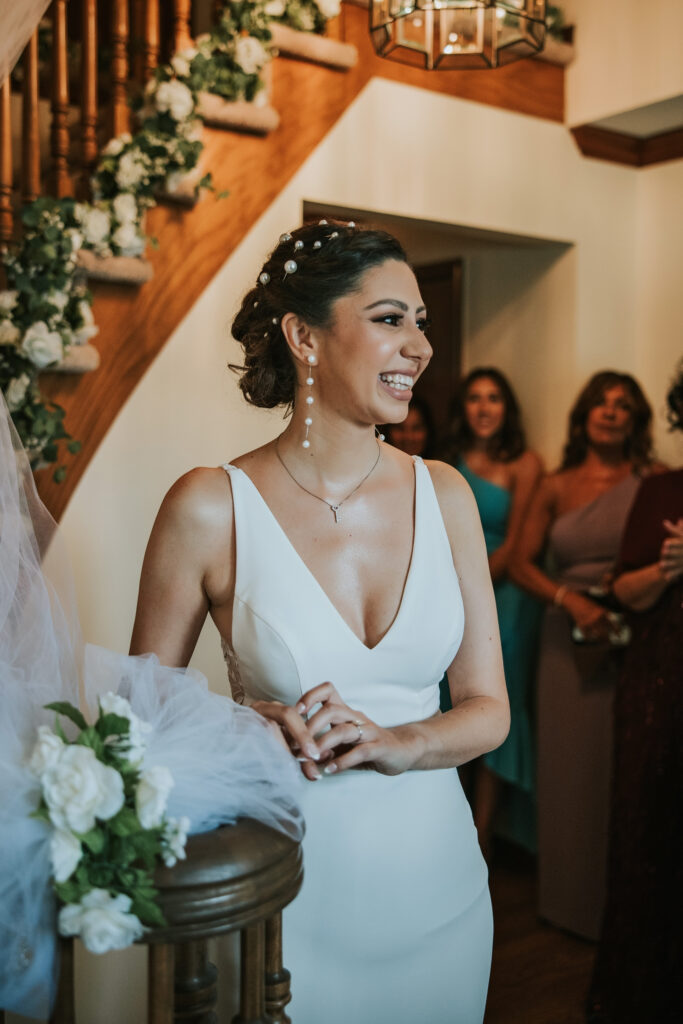 Bride enjoying traditional Chaldean celebration with family before the ceremony at Waterview Loft, Detroit.