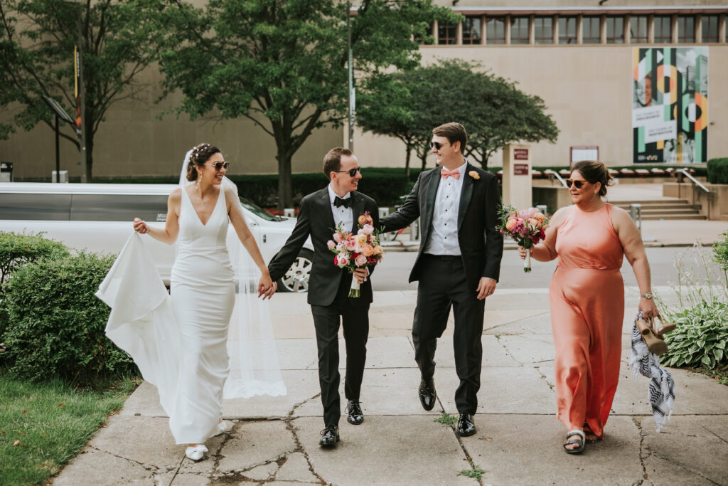 Bride and groom with bridal party at Detroit Main Library, Detroit wedding venue.