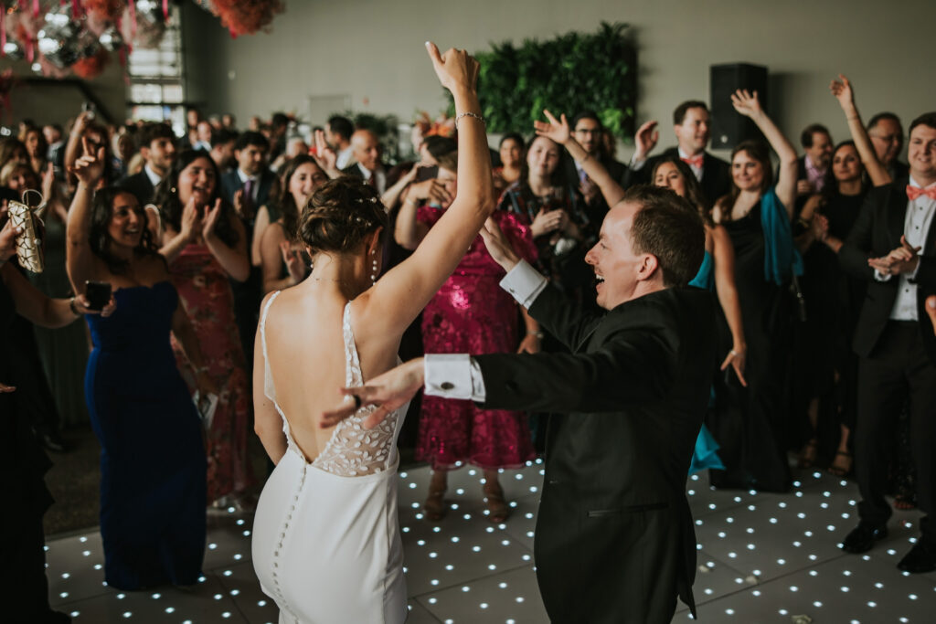 Bride and groom dancing at Waterview Loft, Detroit wedding venue.