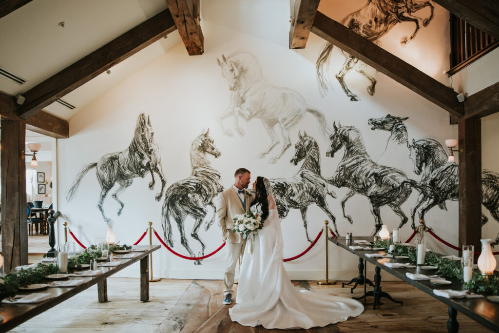 A bride and groom smiling during their wedding ceremony | Wedding Planning Tips