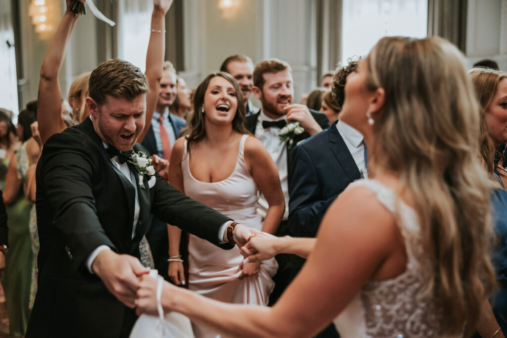 Bride and groom dancing together during their Westin Book Cadillac wedding reception