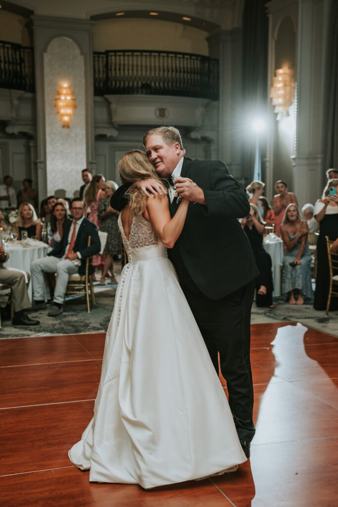 Bride enjoying parent dance during their Westin Book Cadillac wedding reception