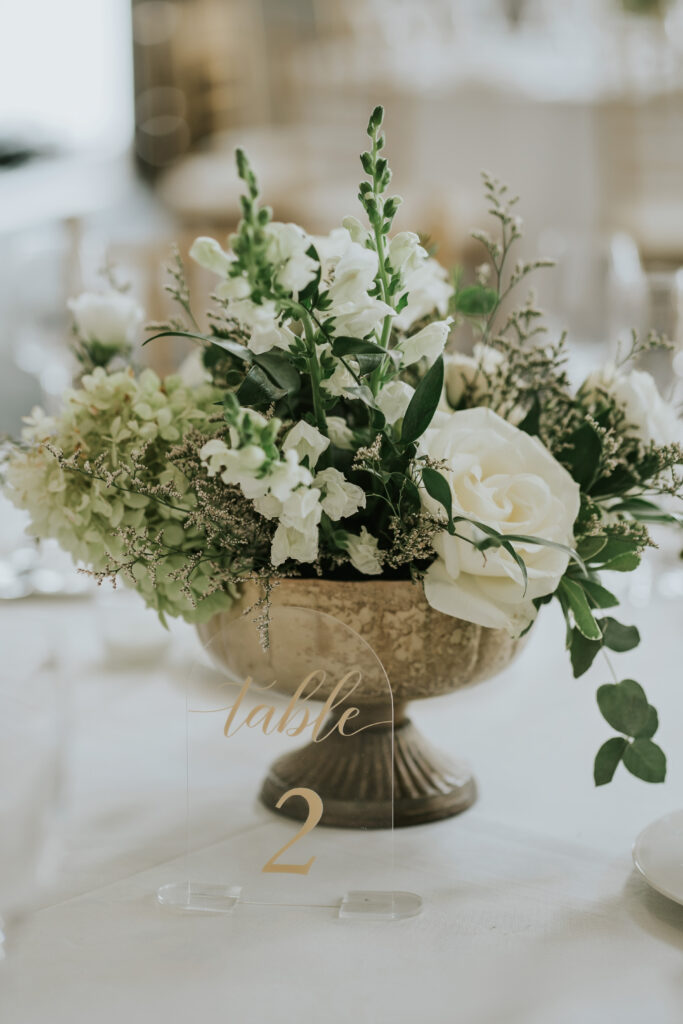 Elegant floral arrangements by Vine Floral Design at the Westin Book Cadillac wedding reception