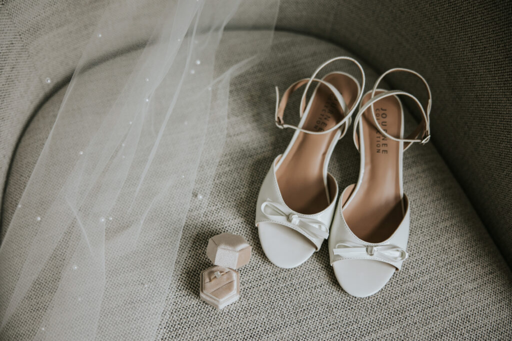 Bridal details of shoes, veil, and ring at a Westin Book Cadillac wedding