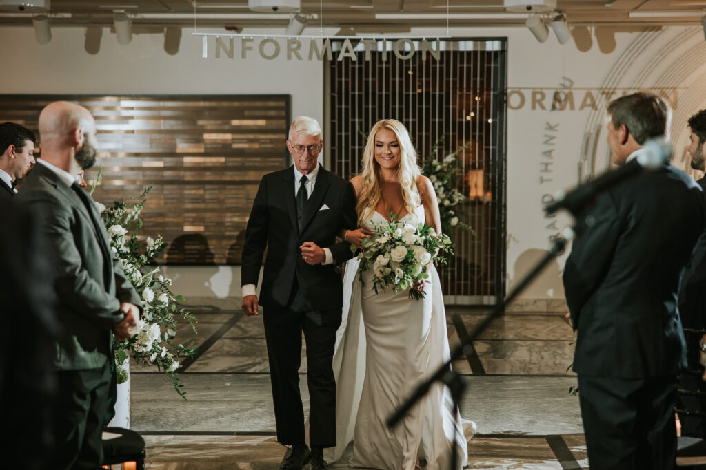 Bride walking down the aisle at the Detroit Institute of Arts