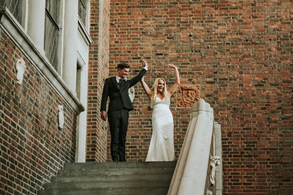 Couple making a grand entrance at the Detroit Institute of Arts.