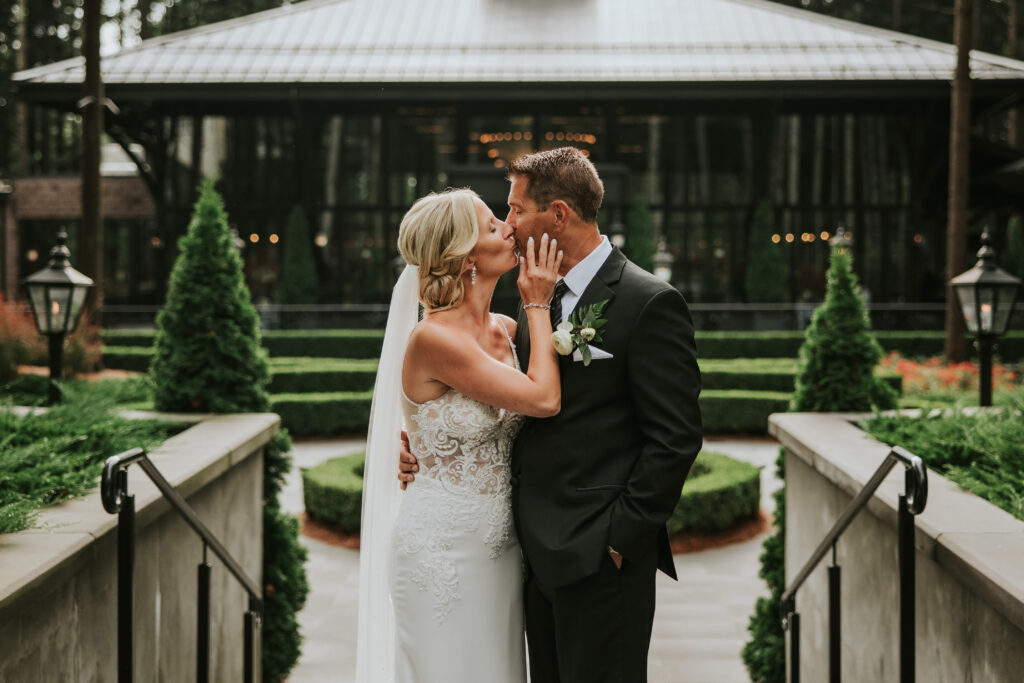 Bride and Groom kissing at their Shepherd's Hollow wedding