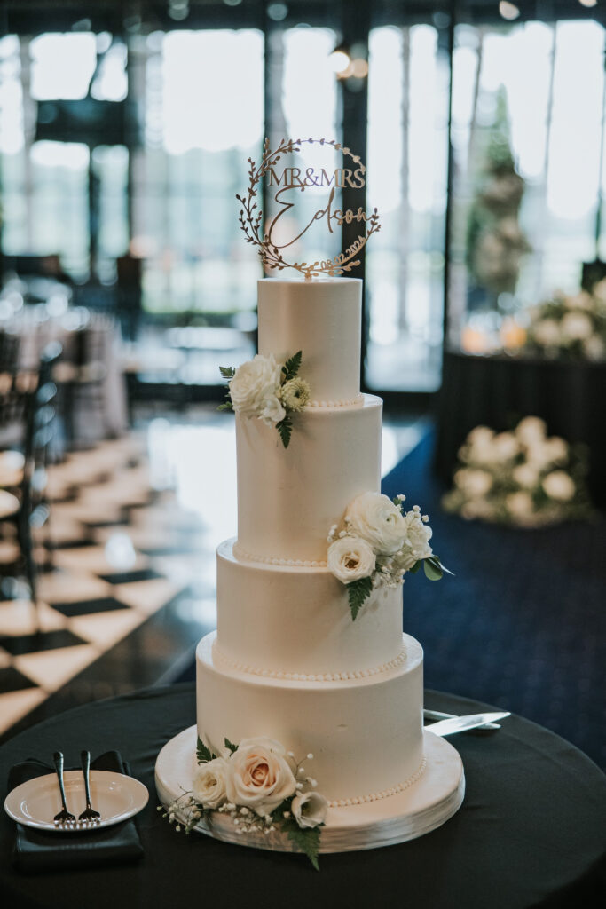 Beautiful white, 4-tiered wedding cake | Shepherd's Hollow wedding photography