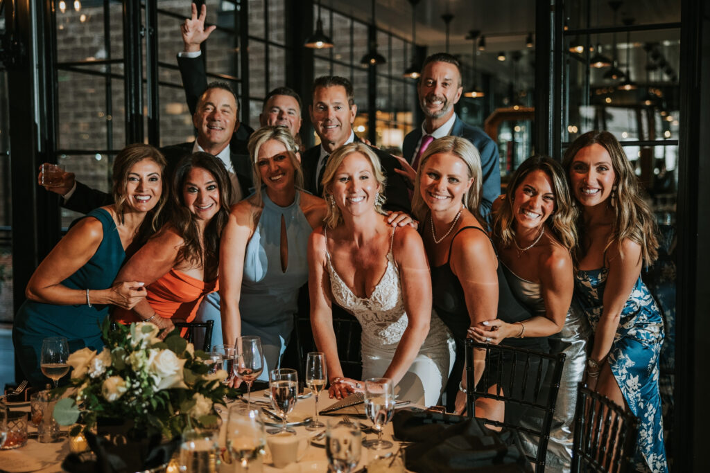 Bride posing for a group photo | Shepherd's Hollow wedding photography