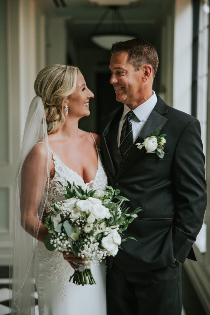 Portrait of a bride and groom looking at each other | Shepherd's Hollow wedding photography