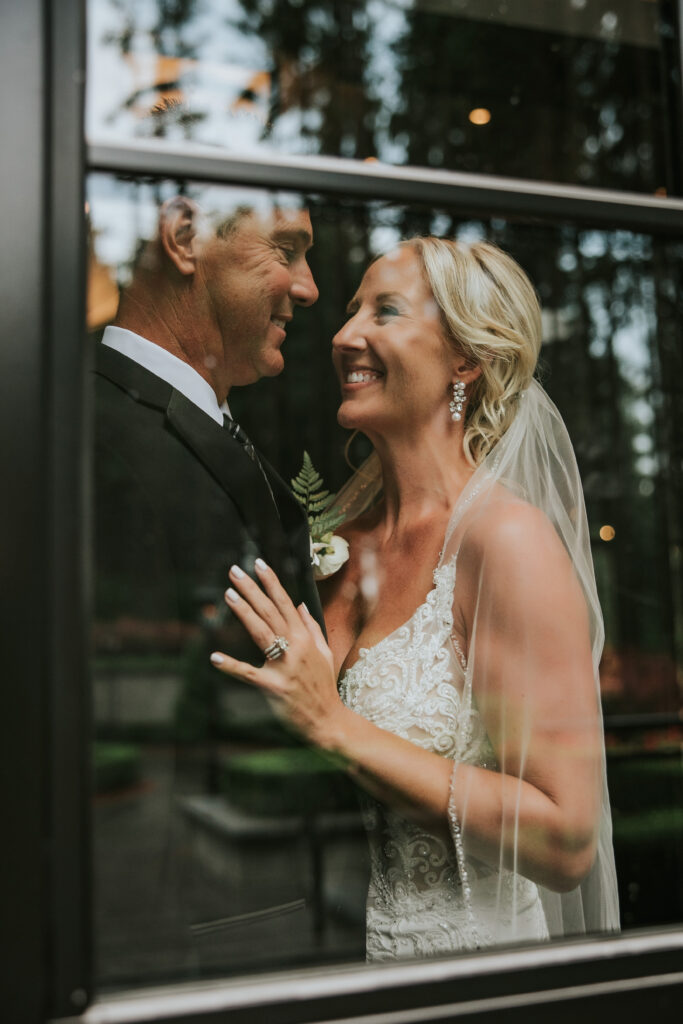 Bride and groom posing for portraits at their Shepherd's Hollow wedding