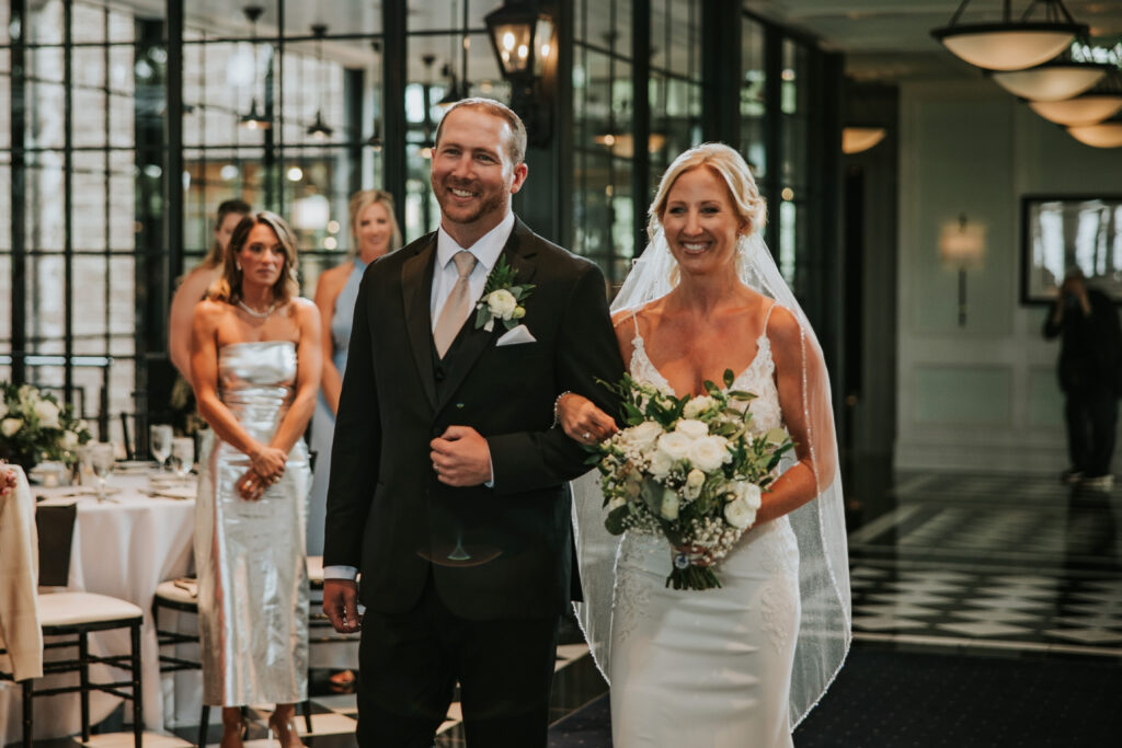 Bride walking down the aisle at her Shepherd's Hollow wedding