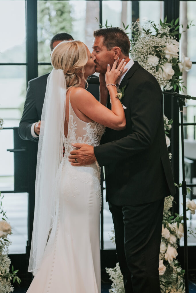 Bride and Groom kissing at their Shepherd's Hollow wedding | Shepherd's Hollow wedding photography