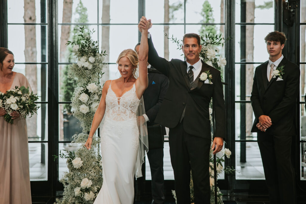 Bride and Groom celebrating their Shepherd's Hollow wedding