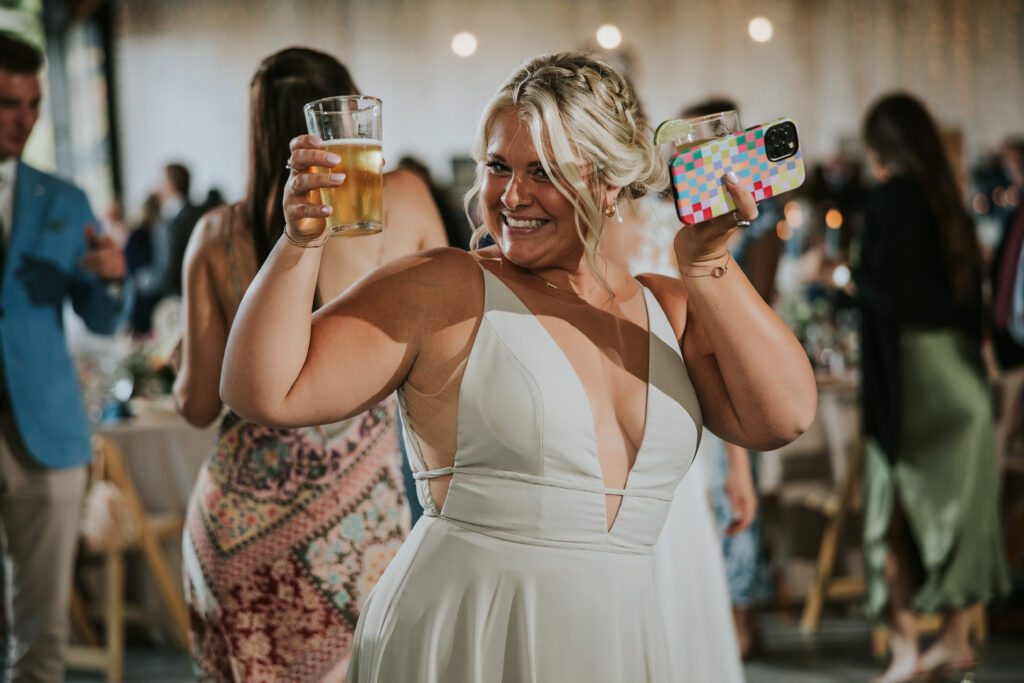 Dynamic dance floor scenes with guests celebrating, Traverse City wedding fun.