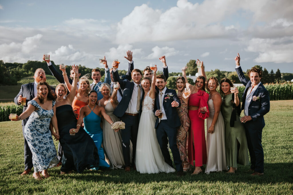 Bride and Groom celebrating with their guests at their Jacob's Farm wedding in Traverse City