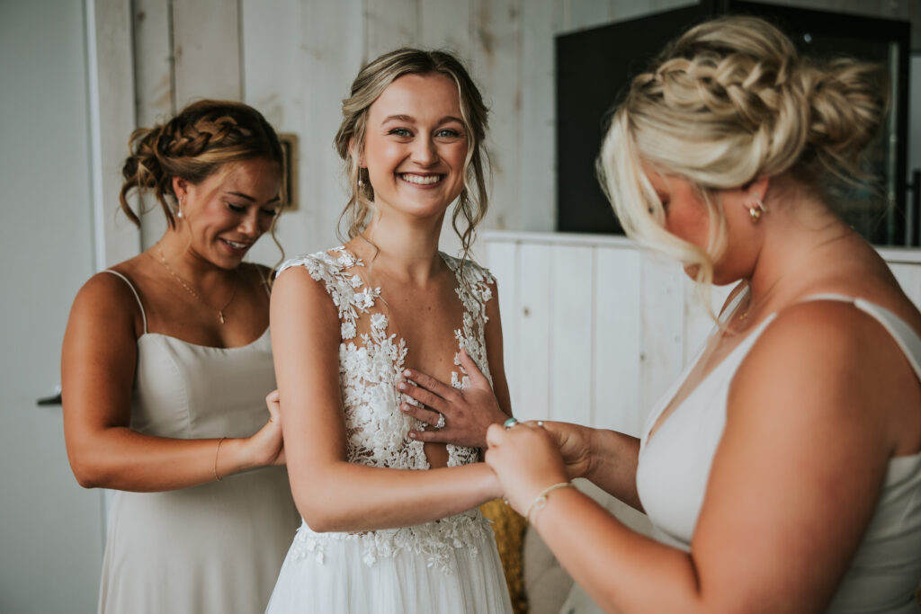 Morning preparations of bride and groom in rustic settings, Traverse City Wedding Photography.