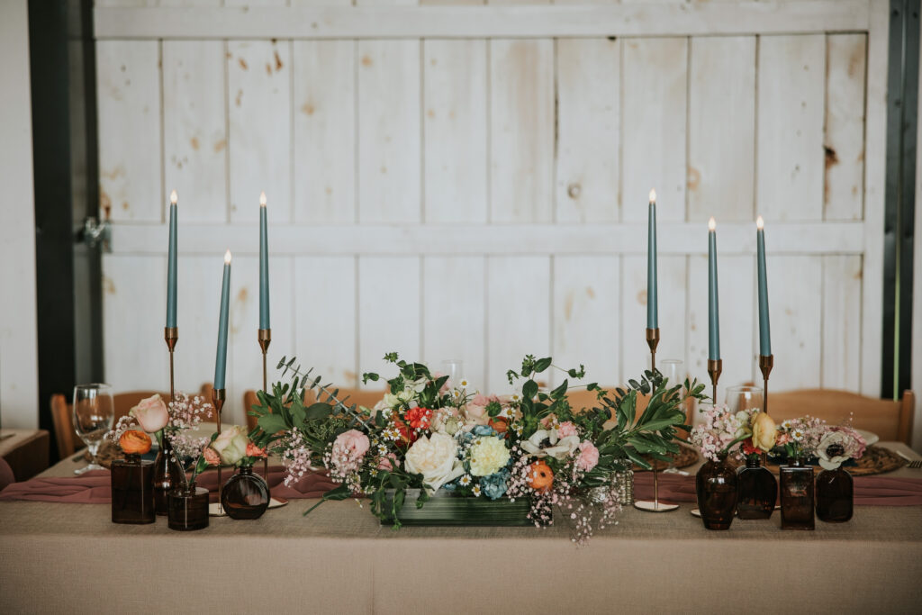 "Floral arrangements by Ash Events and Design enhancing rustic ambiance in Traverse City.