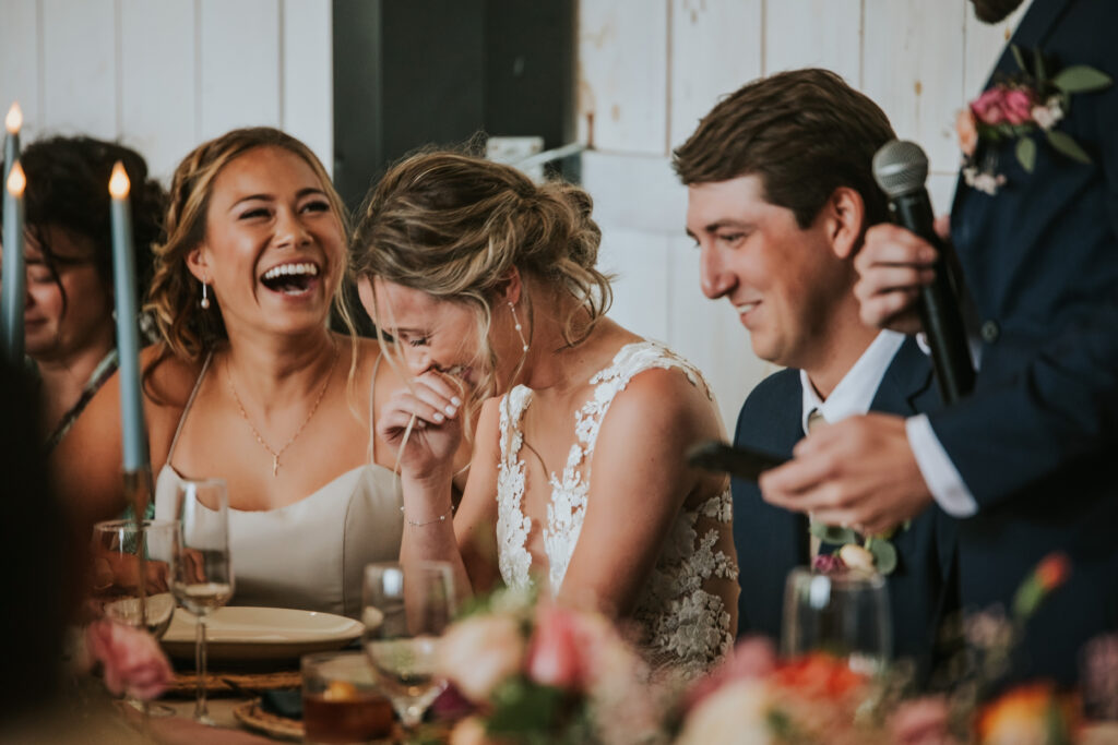 Bride and Groom enjoying their toasts at their Jacob's Farm Traverse City wedding