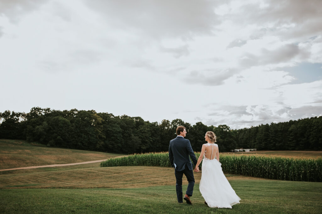 Golden hour lighting on bride and groom, perfect for Traverse City Wedding Photography.